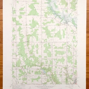 May include: A vintage topographic map of Granville, Ohio, showing the surrounding area with green shaded relief. The map is titled "Granville, Ohio" and includes the text "UNITED STATES DEPARTMENT OF THE INTERIOR GEOLOGICAL SURVEY" and "STATE OF OHIO DEPARTMENT OF NATURAL RESOURCES DIVISION OF GEOLOGICAL SURVEY".