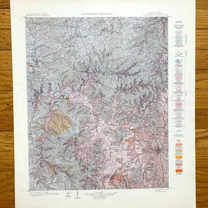 May include: A vintage map of the Columbia Quadrangle in Tennessee, showing geological formations and economic geology. The map is printed in black, white, and shades of pink, brown, and yellow.