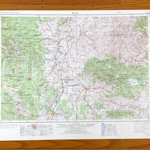 May include: A vintage topographic map of Bend, Oregon, printed on white paper with green and brown lines and text. The map shows roads, rivers, and elevation contours. The map is titled "Bend" in the upper right corner and "7.5 Minute Series (Topographic)" in the upper left corner.