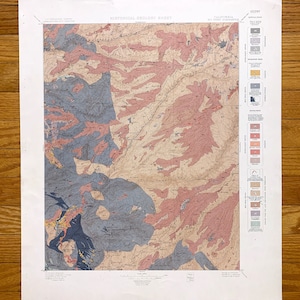 May include: A historical geology sheet map of the Red Creek Quadrangle in California. The map shows the geological formations of the area, including sedimentary rocks, igneous rocks, and metamorphic rocks. The map also includes a legend that explains the different symbols used on the map.