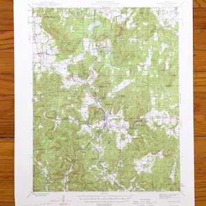 Puede incluir: Un mapa topográfico vintage del estado de Misuri, que muestra el área alrededor de la ciudad de Salem. El mapa está impreso en papel y tiene un esquema de color verde y marrón. El mapa incluye líneas de elevación, ríos y carreteras.