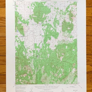 May include: A vintage topographic map of the Gray Quadrangle, California, published by the United States Geological Survey. The map shows the terrain, elevation, and features of the area, including mountains, rivers, and roads. The map is printed on paper and has a green and brown color scheme.