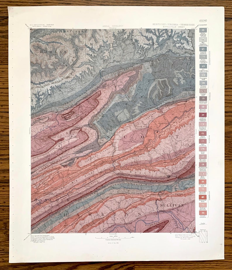 Puede incluir: Un mapa geol&oacute;gico vintage del &aacute;rea de Kentucky-Virginia-Tennessee, que muestra las formaciones geol&oacute;gicas en varios colores. El mapa est&aacute; titulado "AREAL GEOLOGY" e incluye una leyenda con diferentes tipos de rocas y sus colores correspondientes.