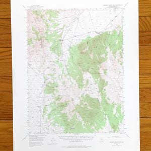 May include: A topographic map with green and white terrain features, including contour lines and elevation markings. The map is printed on white paper and shows a detailed geographical area. The map is titled "Roberts Creek With Westbranch".