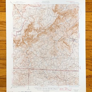 May include: A vintage topographic map of the Appalachian Mountains in Virginia. The map is printed in brown and black ink on white paper. The map shows the location of roads, rivers, and mountains. The map is dated January 1964.