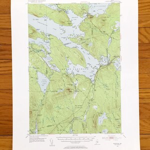 May include: A detailed topographic map of the Indian Purchase area in Maine, showing contour lines, lakes, and place names. The map is printed on white paper and includes the text "UNITED STATES DEPARTMENT OF THE INTERIOR GEOLOGICAL SURVEY".