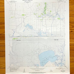 Pode incluir: Um mapa topográfico vintage de Black Lake, Louisiana, com o título "Black Lake Quadrangle" e "1:24,000" impresso no canto superior direito. O mapa mostra a geografia da área, incluindo estradas, rios e lagos.