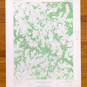May include: A vintage topographic map of the area around Shanks Ford, Pennsylvania. The map is printed in black and green ink on white paper. The map shows roads, rivers, and other geographical features.