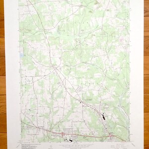 May include: A vintage topographic map of Mount Chestnut quadrangle, Pennsylvania, showing roads, rivers, and elevation contours. The map is printed on paper and has a green and brown colour scheme.