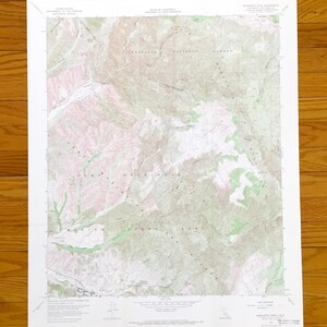 May include: A large, rectangular topographic map of the Margarita Peak area in California, published by the United States Geological Survey. The map features detailed contour lines, elevation data, and geographic labels in shades of green, tan, and white.