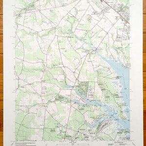 May include: A vintage topographic map of the Fairmount, Delaware area. The map shows roads, rivers, and other geographical features. The map is printed on paper and has a scale of 1:24,000.