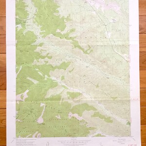 May include: A vintage topographic map of the Telegraph Peak area in California. The map shows the terrain, elevation, and features of the area, including mountains, rivers, and roads. The map is printed on paper and has a green and brown color scheme.