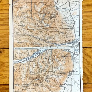 May include: A vintage map of the Barr region of France, showing the towns and villages of the area. The map is printed in black and white with brown and blue accents. The map is titled "Barr" and includes a scale of 1:80,000.