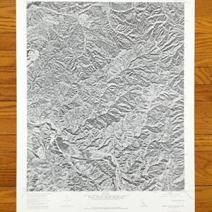 May include: Black and white aerial photograph of a mountainous region. The image is a topographic map showing the terrain of the Black Bear Canyon area.