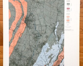 May include: A historical geology sheet map of New Jersey, showing the geological formations of the area. The map is in black and white with colored overlays showing the different geological periods. The map includes a legend and a scale.