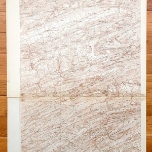 May include: A vintage topographic map of the Millheim Quadrangle in Pennsylvania. The map shows elevation contours, rivers, roads, and other features. The map is printed on paper and has a scale of 1:24,000.