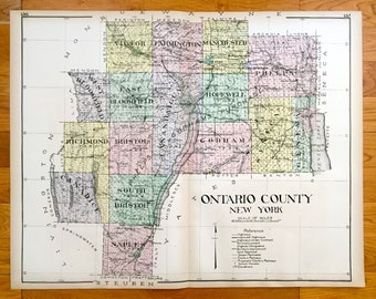 May include: A vintage map of Ontario County, New York, with a grid of townships and towns, including Victor, Farmington, Manchester, Phelps, Hopewell, Gorham, Richmond, Bristol, Canandaigua, South Bristol, Naples, and more. The map is printed in black and white with colored borders for each township.