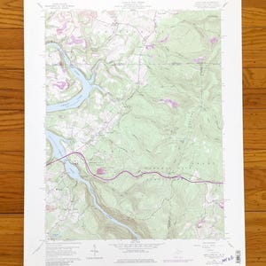 May include: A topographic map of the Lake Lynn Quadrangle in West Virginia, featuring contour lines, water bodies, and labeled geographical features. The map is printed on white paper and includes details from the U.S. Department of the Interior Geological Survey.