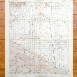 May include: A vintage topographic map of the Mojave River Valley in California, showing the surrounding mountains, roads, and towns. The map is printed on a cream-colored paper with brown lines and text. The map is titled "City of Los Angeles, Board of Public Works, Topographic Map, Mojave River Valley, California".