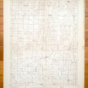 May include: A vintage topographic map of Monroe, Owen, Pike, Jackson, and Greene counties in Indiana. The map shows the county lines, roads, rivers, and other geographical features. The map is printed in black and white on a white background.