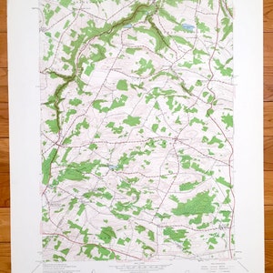 May include: A vintage topographic map of Millers Mills, New York, printed by the United States Department of the Interior Geological Survey and the United States Department of the Army Corps of Engineers. The map shows the area's terrain, roads, and waterways.