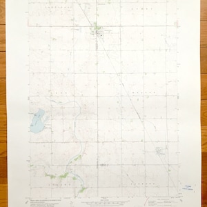 May include: A black and white topographic map of the area around Selma City, Oklahoma. The map shows roads, rivers, and other geographical features. The map is titled "Selma City, Oklahoma" and includes the text "7.5 Minute Series (Topographic)".