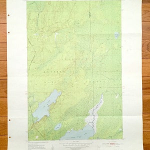 May include: A vintage topographic map of the Barrett Lake area in California. The map shows the location of Barrett Lake, Green River Lake, and surrounding forests. The map is printed on a light green background with brown lines and text.