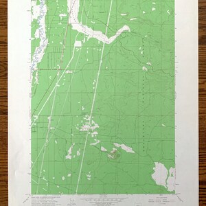 May include: A vintage topographic map of the Finley Butte, Oregon area. The map is printed on white paper with green lines and text. The map shows the location of roads, rivers, and other features. The map is titled "Finley Butte Quadrangle".