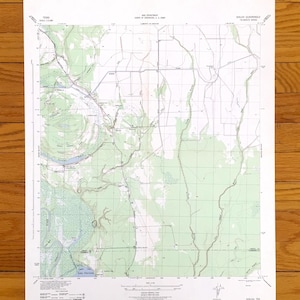 May include: A vintage topographic map of the Shelby Quadrangle in Texas, featuring detailed contour lines, roads, and geographical features. The map is printed on aged paper and includes text indicating the map's scale and the U.S. Army Corps of Engineers.