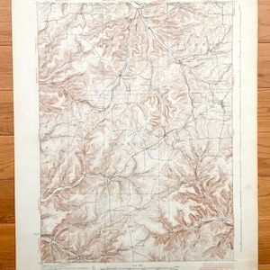 May include: A vintage topographic map of the Allegany, New York area. The map shows the terrain with brown contour lines and includes the names of nearby towns like "Gresham", "Bingham", "Allegany", and "Sweden".