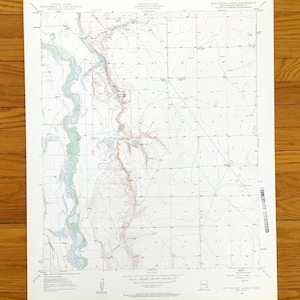 May include: A vintage topographic map of the Bottomless Lakes Quadrangle in New Mexico, featuring detailed contour lines, water features, and grid lines. The map is printed on aged paper and includes text from the United States Department of the Interior.