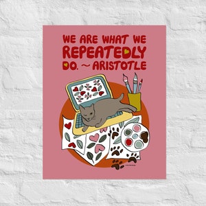 May include: A pink background with a quote from Aristotle: "We are what we repeatedly do." The quote is in red text with a heart symbol. A gray cat is lying on a laptop computer with a paint palette, paintbrushes, and papers with hearts and paw prints on them.