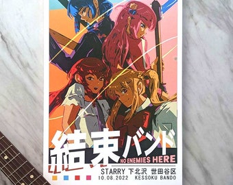 May include: A poster featuring four anime-style characters with musical instruments. The artwork has a vibrant color scheme of orange, pink, and blue. Japanese text and the words "NO ENEMIES HERE" are at the bottom. The poster includes the text "STARRY 下北沢 世田谷区 10.08.2022 KESSOKU BANDO".