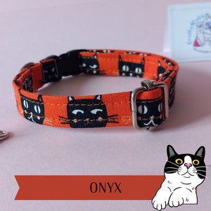 Black cats collar &#39;Onyx&#39; on orange - glow in the dark cats eyes, with bell