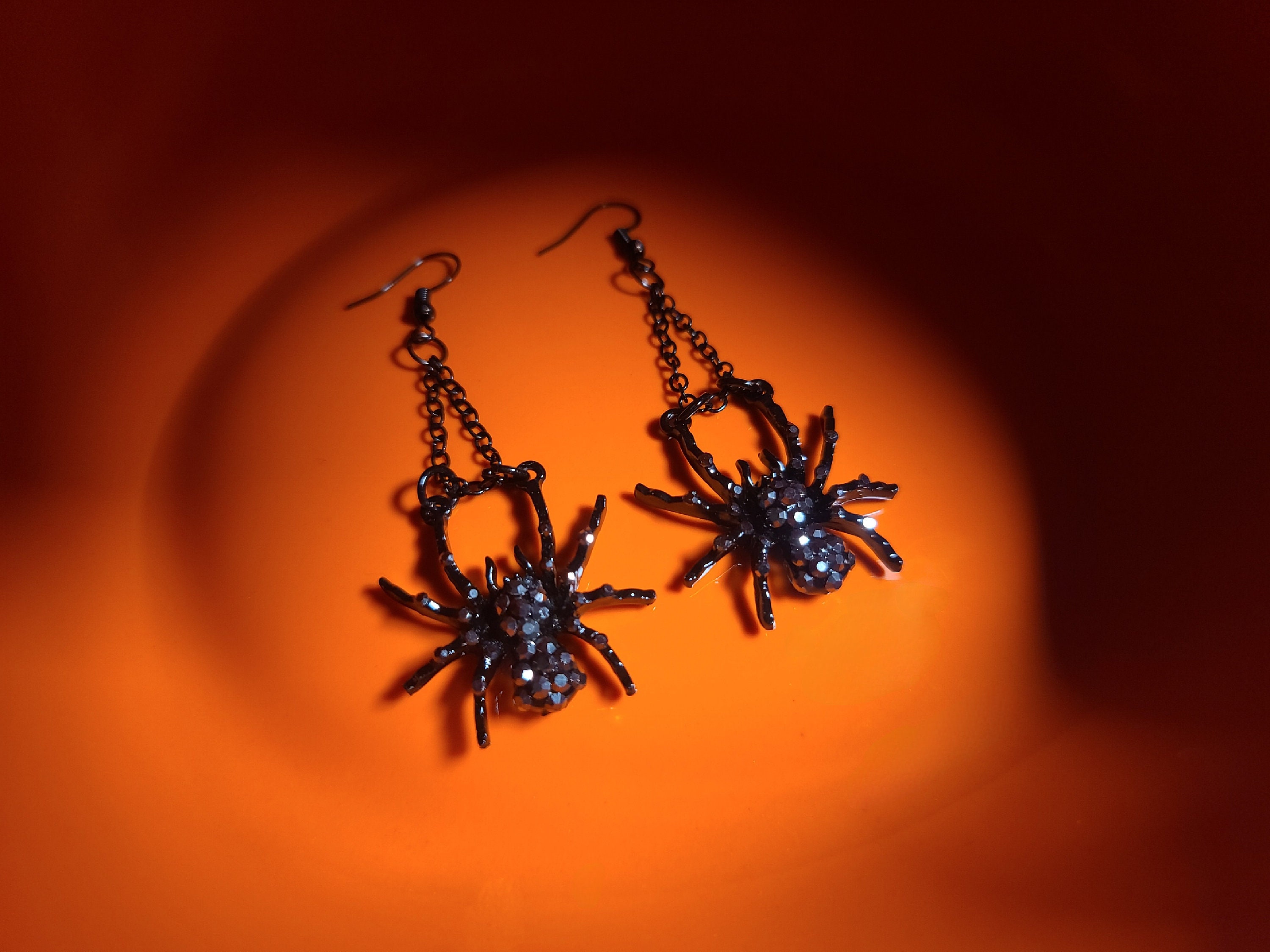 Pink spider earrings