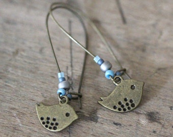 Boucles d’oreilles VENTE % long avec perles de verre