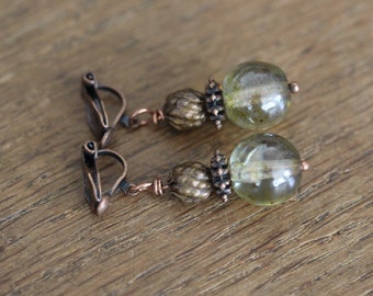 magical ear clips made of glass and brass