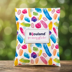 Bijouland gift packaging shown as a colorful watercolor mailer with a Your Amazing Gift Is Here label.