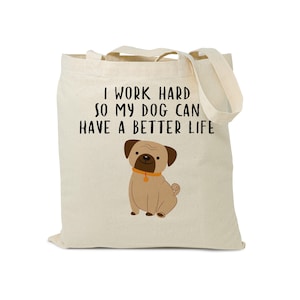 Front view of a dog lover tote bag printed with a seated pug and the phrase I Work Hard So My Dog Can Have a Better Life.