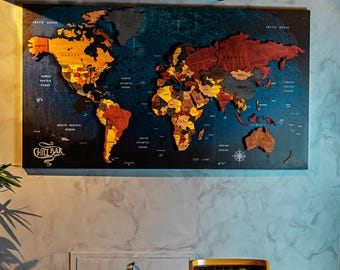 May include: A large, wooden world map with countries in various wood tones against a dark blue background. The map is mounted on a wall and includes the text "Chill Bar" at the bottom left.