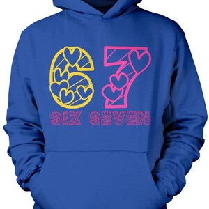 May include: A blue hoodie with a front pocket and a hood. The front of the hoodie features the number "67" in a pink and yellow heart design, with the words "SIX SEVEN" printed below.