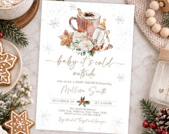 May include: A white baby shower invitation card featuring a watercolor illustration of a mug, baby bottle, and gingerbread cookie. The text reads: baby it's cold outside, Join us for a BABY SHOWER honoring Mellisa Smith, DECEMBER 24 AT 3:00PM.