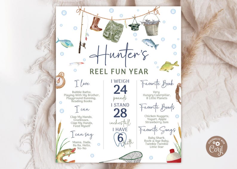 May include: A blue and white illustrated printable chart for a child's first year. The chart features a fishing theme with a title that reads "Hunter's Reel Fun Year". The chart includes details about the child's growth, including weight, height, favorite books, foods, and songs.