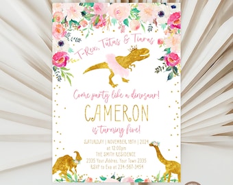 May include: A rectangular birthday invitation card featuring a gold glitter T-Rex wearing a pink tutu and tiara, surrounded by watercolor floral arrangements. The text reads T-Rex, Tutas & Tiaras, Come party like a dinosaur!, CAMERON is turning five!, and event details.
