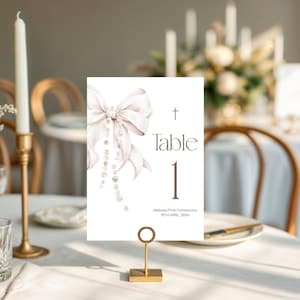 May include: A set of three ceramic mugs with a speckled, matte finish. The mugs are in shades of cream, light gray, and dark gray. Each mug has a simple, minimalist design and a rounded handle. Perfect for coffee or tea.