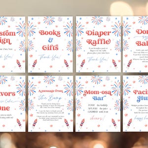 May include: Set of eight baby shower signs with red, white, and blue fireworks and star designs. Each sign has a different message, including "Custom Sign," "Books & Gifts," and "Diaper Raffle."