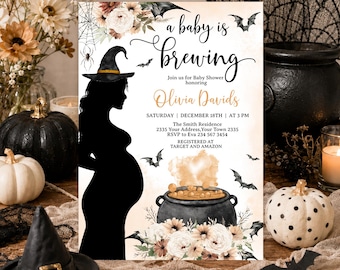 May include: A rectangular baby shower invitation card featuring a black silhouette of a pregnant person wearing a witch hat, a black cauldron, bats, spiderwebs, and floral accents. The text reads: a baby is brewing, Olivia Davids, December 18th.