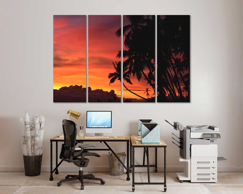 May include: A multi-panel canvas print featuring a sunset over a silhouette of palm trees. The print is divided into three sections, each showing a different part of the sunset. The colors are warm and inviting, with shades of orange, red, and pink. The print is perfect for adding a touch of tropical flair to any room.