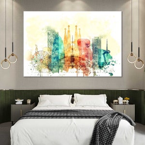 May include: A watercolor painting of a cityscape with a Ferris wheel, buildings, and a church. The painting is in shades of blue, green, yellow, orange, and red.