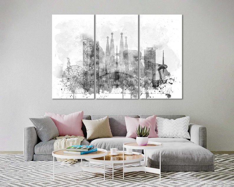 May include: A black and white watercolor painting of the Barcelona skyline, featuring iconic landmarks like the Sagrada Familia and the Ferris wheel.
